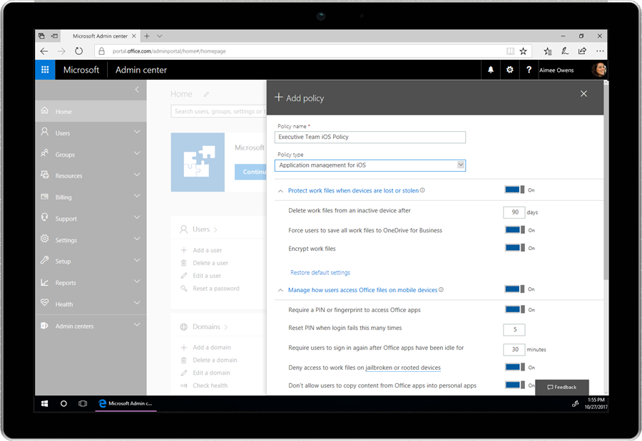 A smart device displays the Microsoft Admin center.