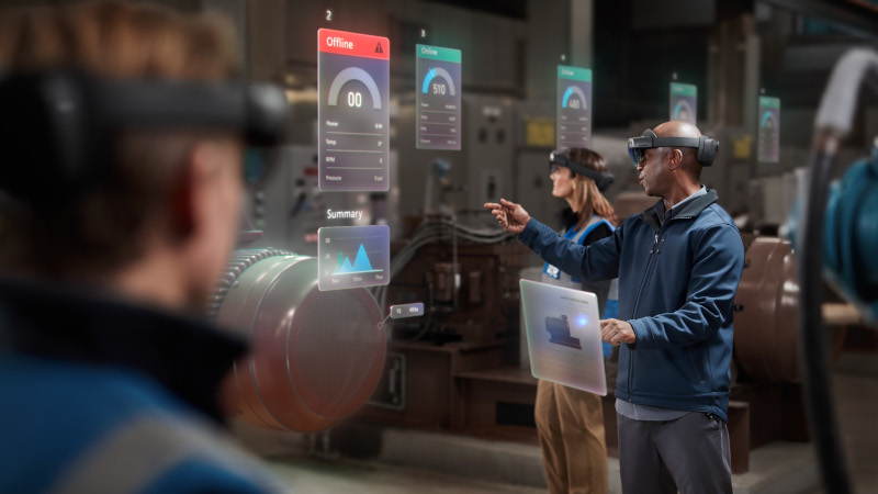 die Menschen in einer Fabrik mit moderner IoT-Technologie arbeiten