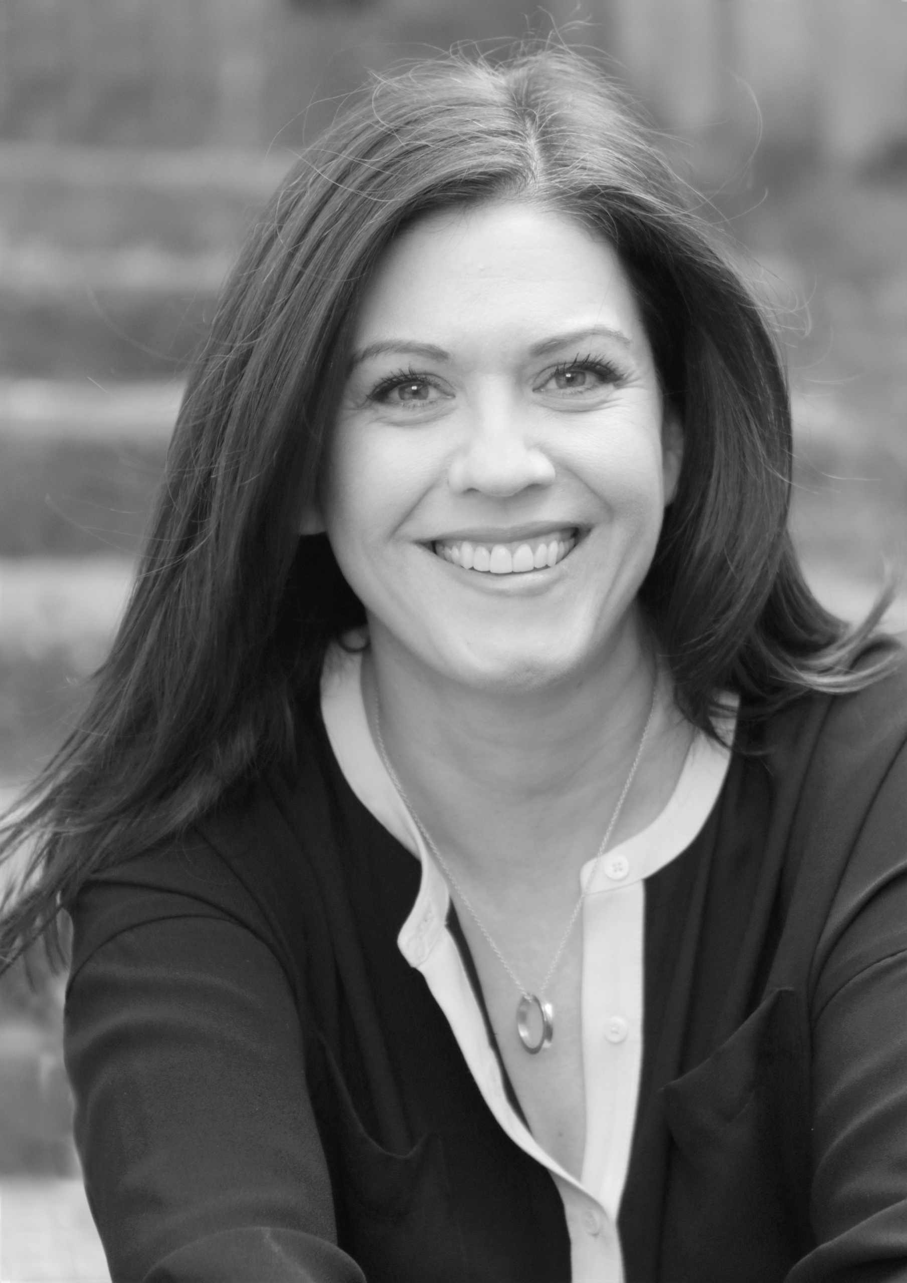 Jennifer Morrison smiling for the camera