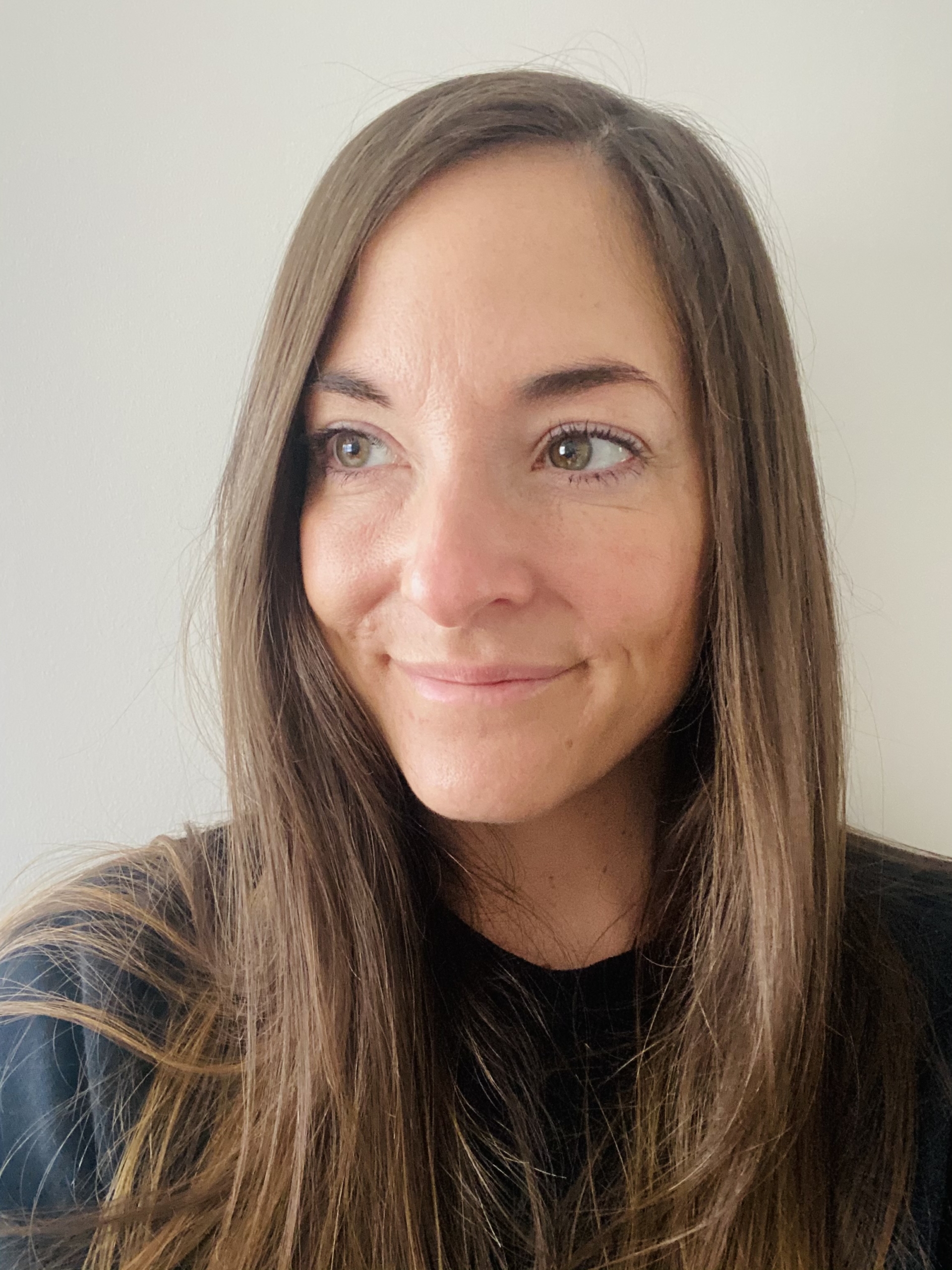 Danielle Lara smiles at the camera