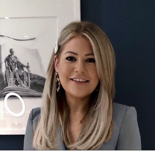 a woman smiling for the camera