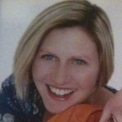 a woman smiling for the camera