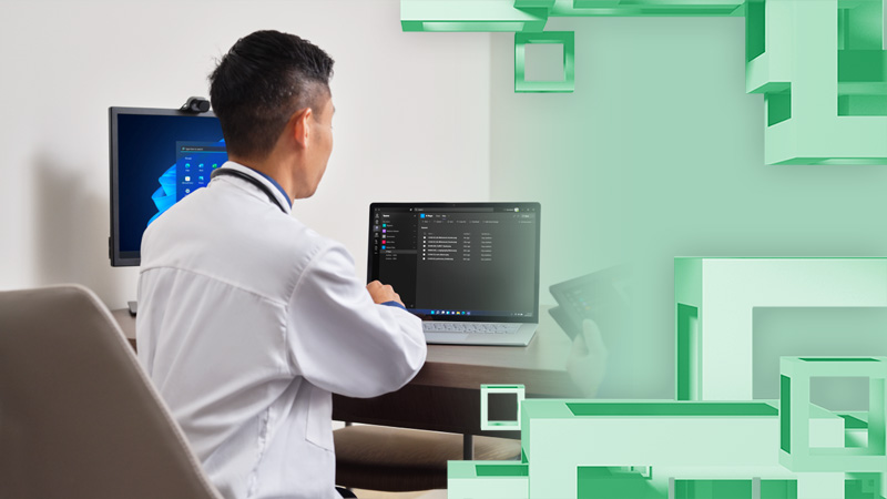 Doctor sits at office desk