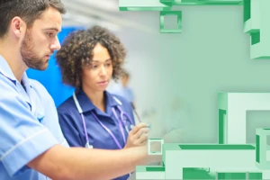 Two healthcare employees working