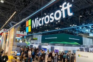 a crowd of people standing in front of a store