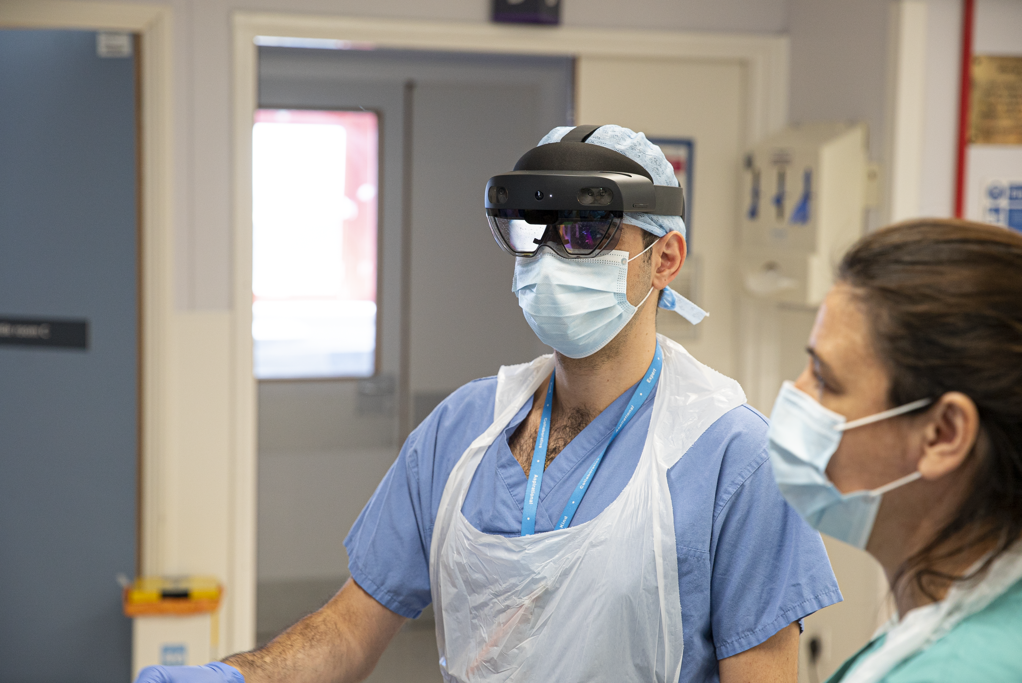 NHS doctors at St. Mary&rsquo;s hospital from different specialities discuss a patient on a COVID-19 ward
