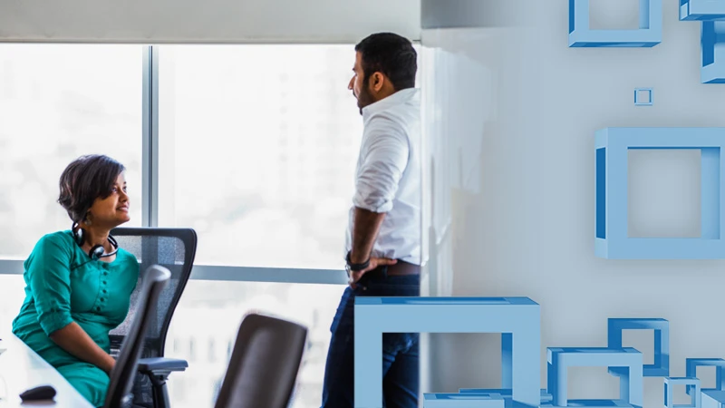 Two people in a business meeting