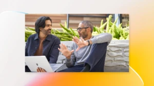 A group of men sitting outside