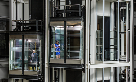 Image of two elevators passing