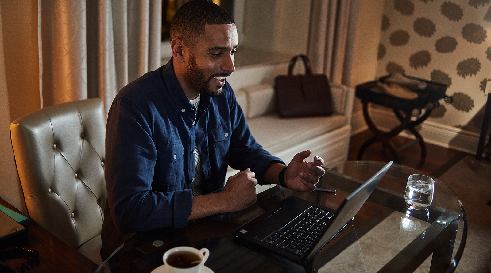 A man working and interacting with his PC