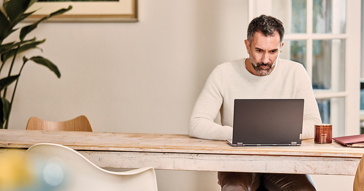 Image of a remote worker at his laptop