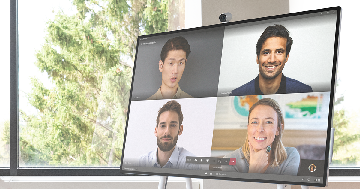 Image of teammates connecting on a Surface Hub