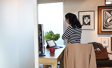 Image of a remote worker in her home