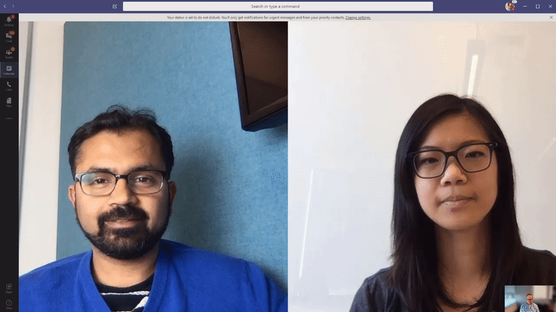 Two Microsoft Teams users using live captions in a meeting.