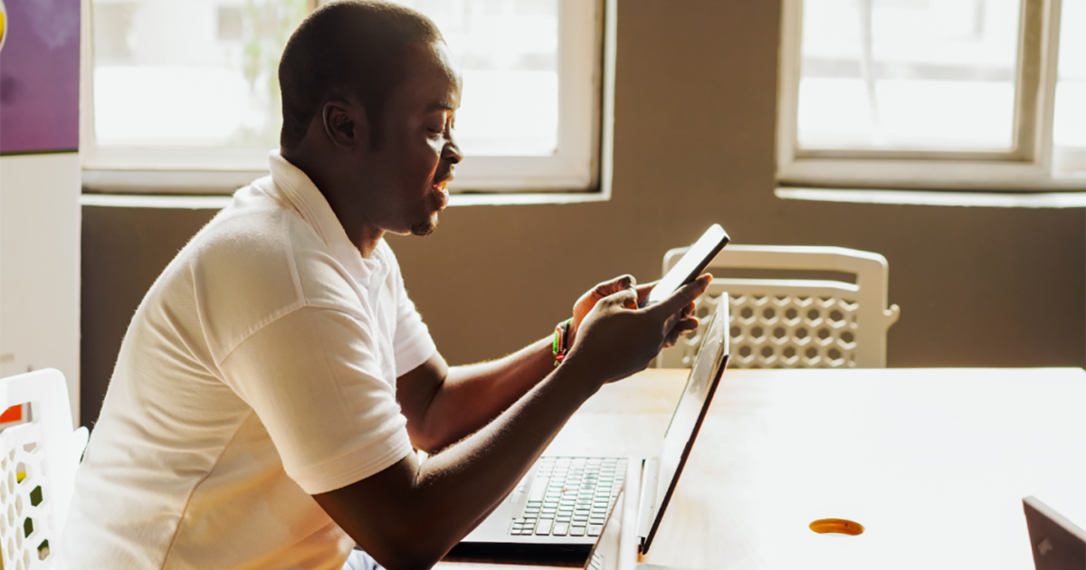An image of an African male founder working in conference room location in Ghana
