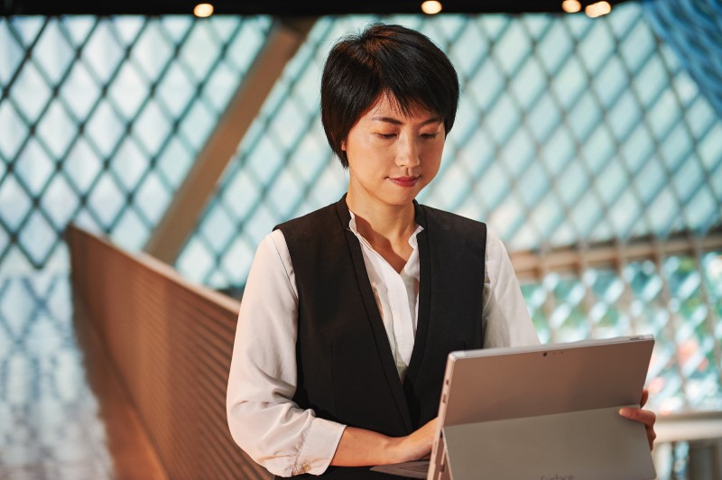 Woman using Surface Pro inside the Seattle Public Library