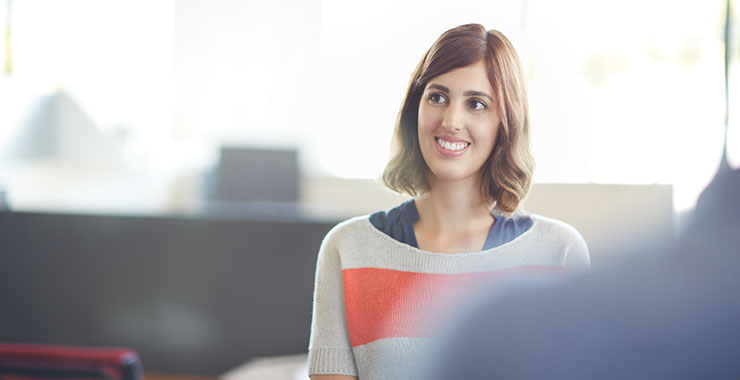 a woman smiling for the camera
