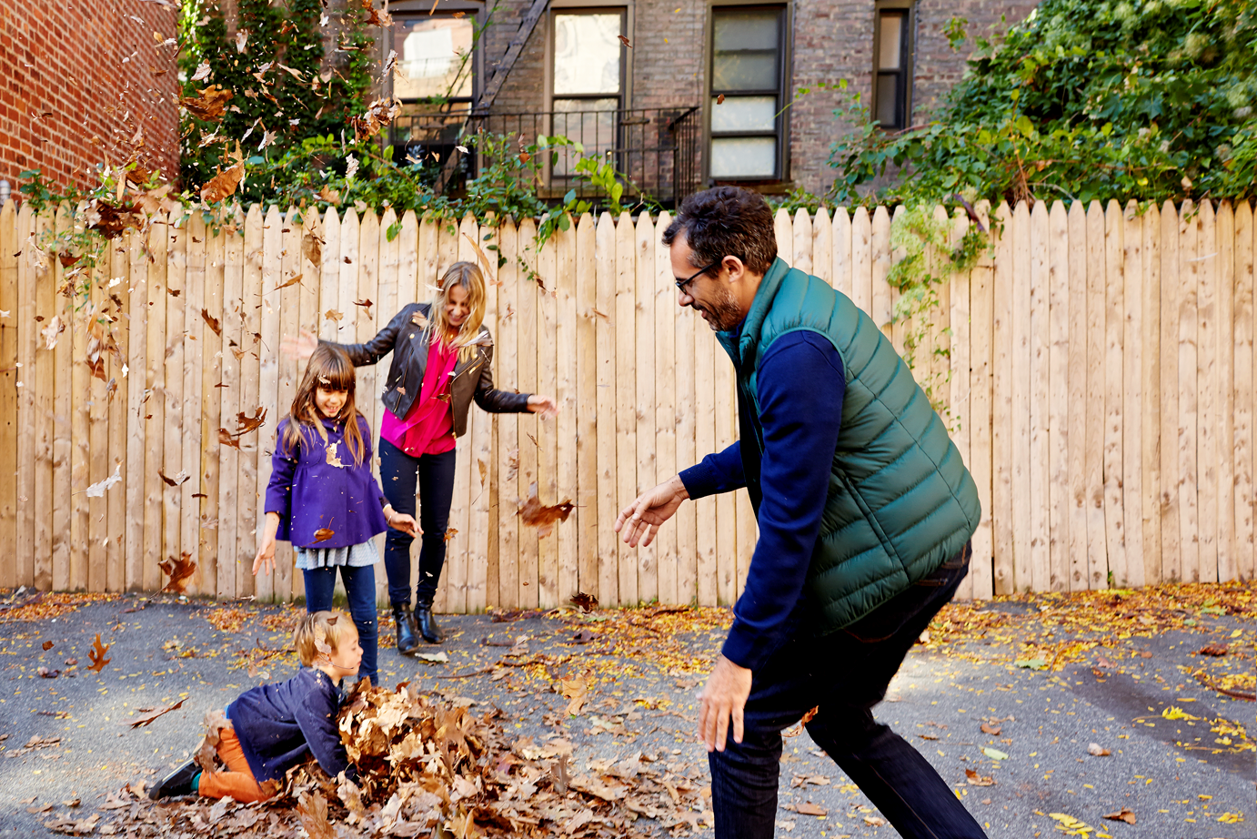 a group of people standing in front of a building
