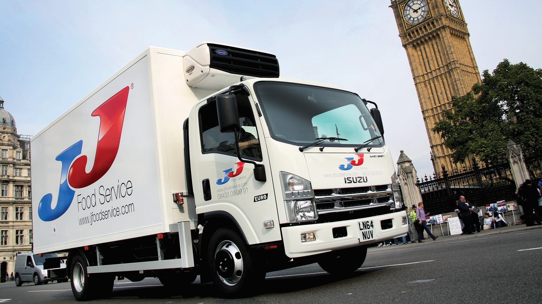 a truck is parked on the side of a road