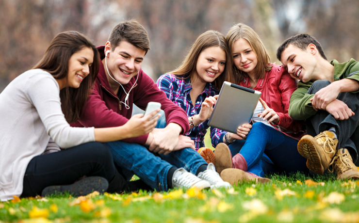 a group of people sitting posing for the camera