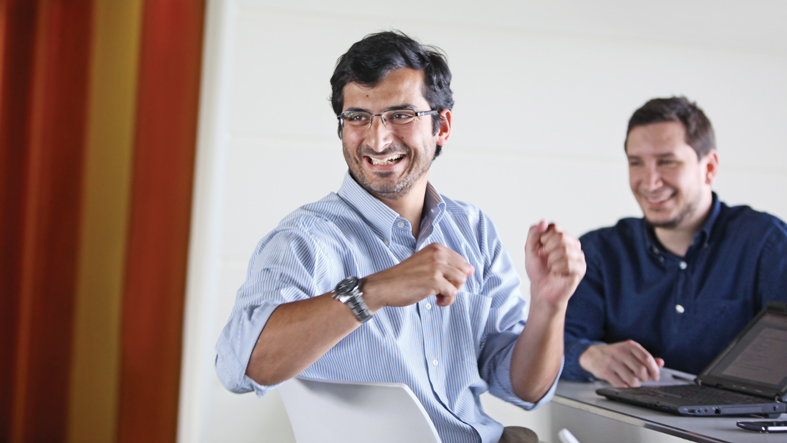 a man holding his hands up