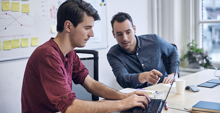 a group of people around each other