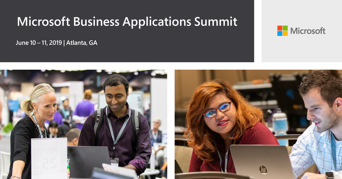 a group of people in front of a screen