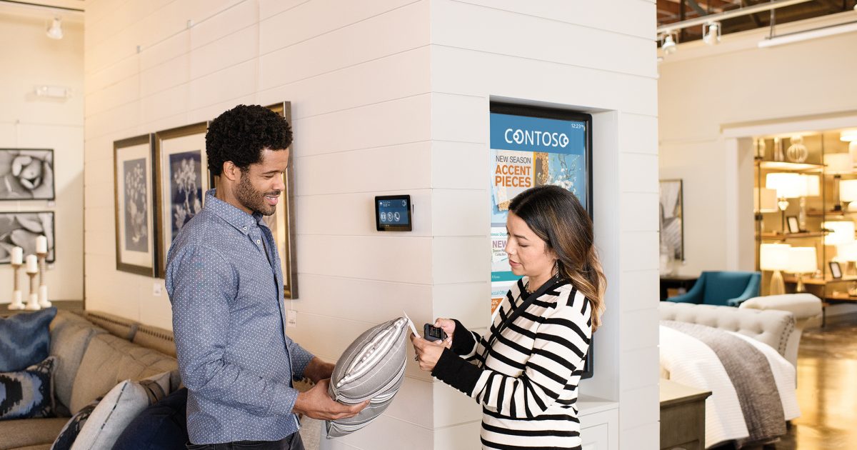a group of people standing in a room