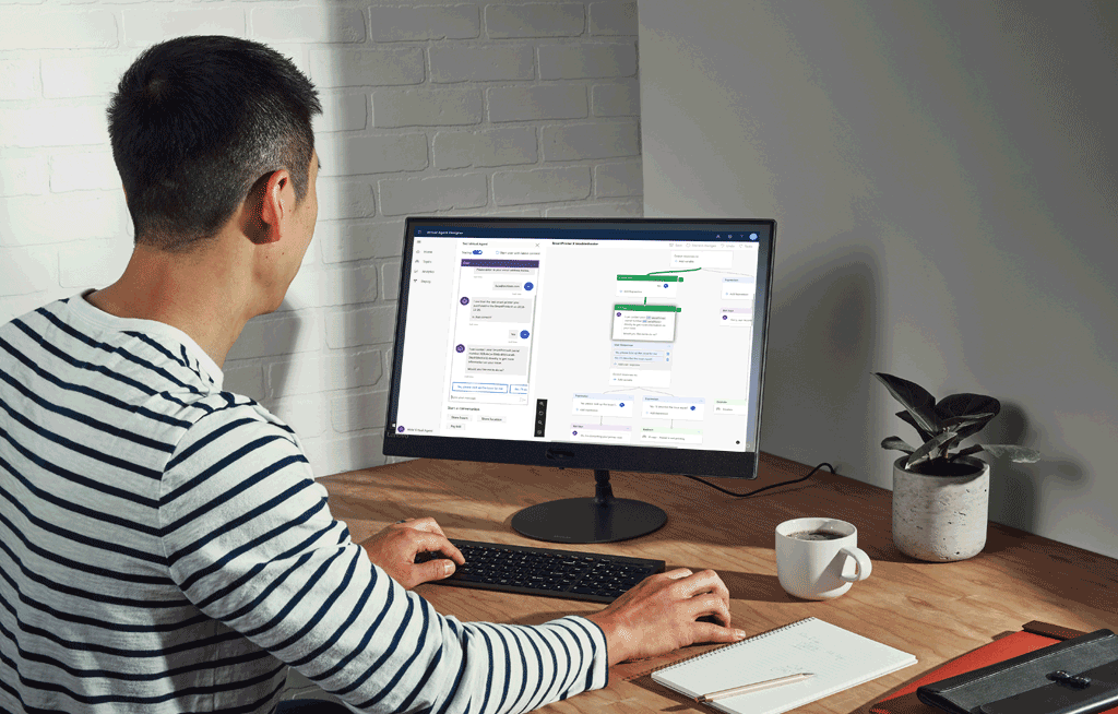 a person standing in front of a computer