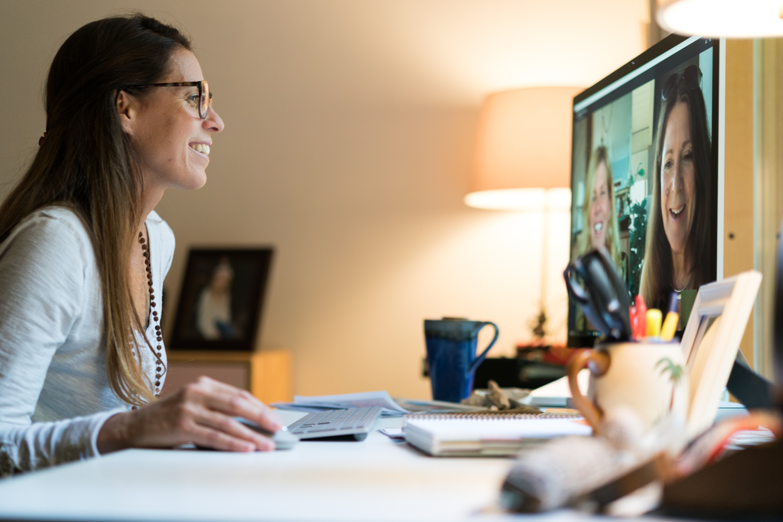 a woman sitting at a desk