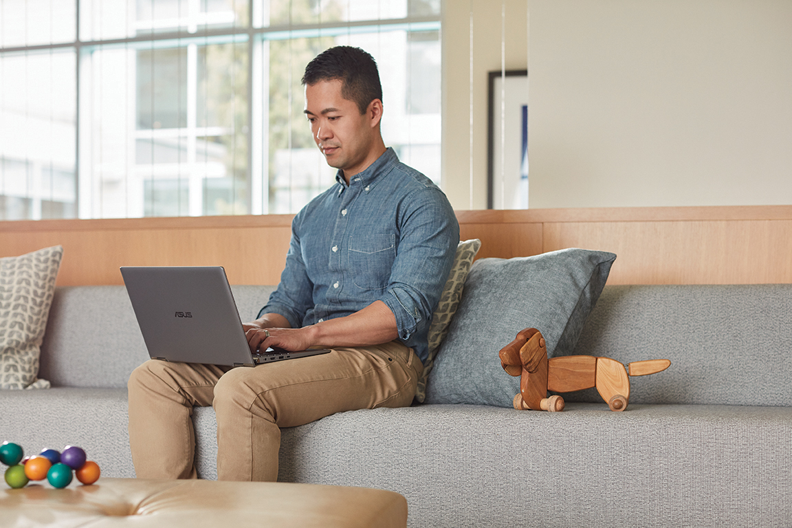 a man sitting on a sofa