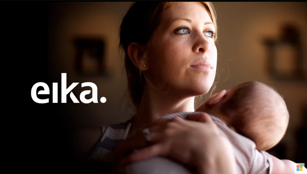 Screenshot of the linked video with Eika logo and an image of a woman holding a baby.