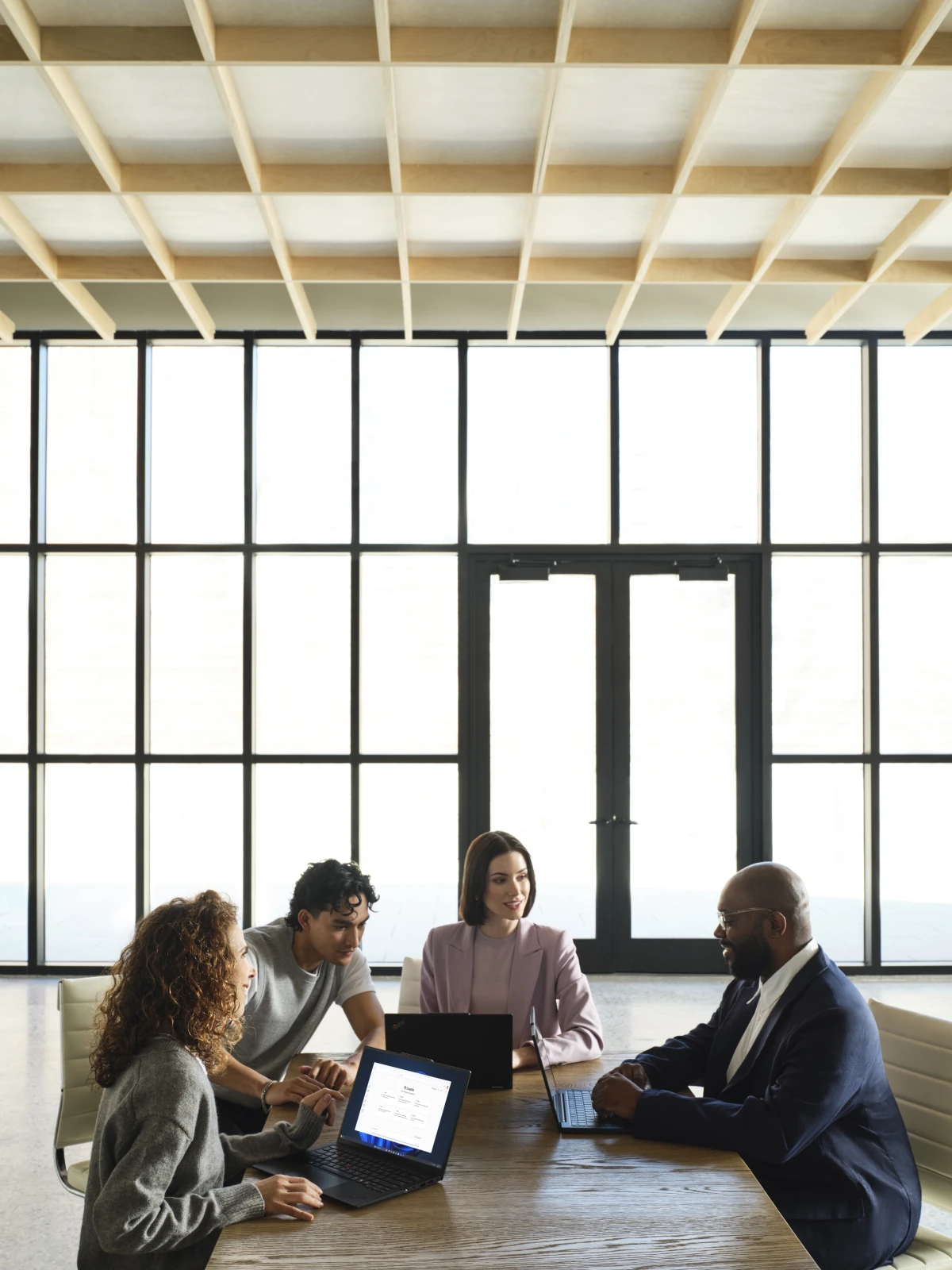 A group of people sitting around a table