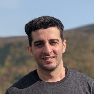 A man smiling for a picture