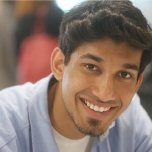 A man smiling at the camera