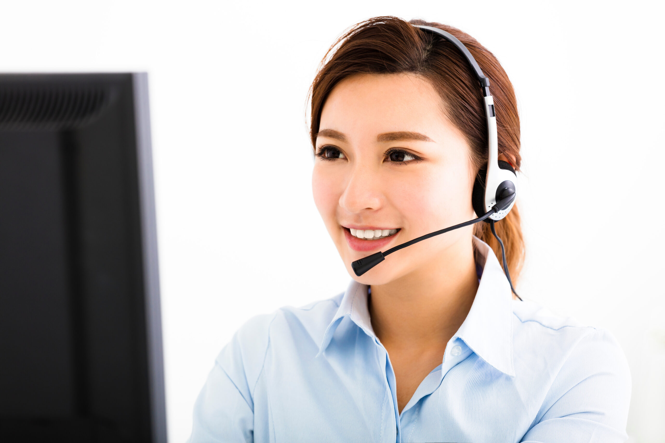 Woman at desktop working at a call center