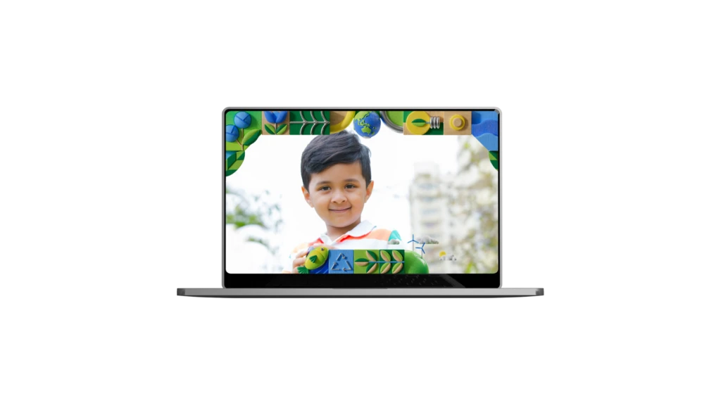 A laptop displaying an image of a child surrounded by plant designs along the border.