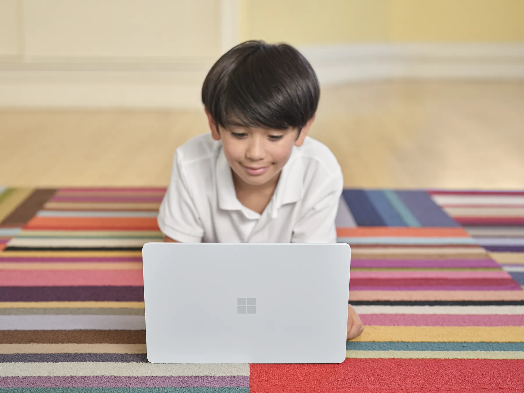 Kid laptop on carpet v2
