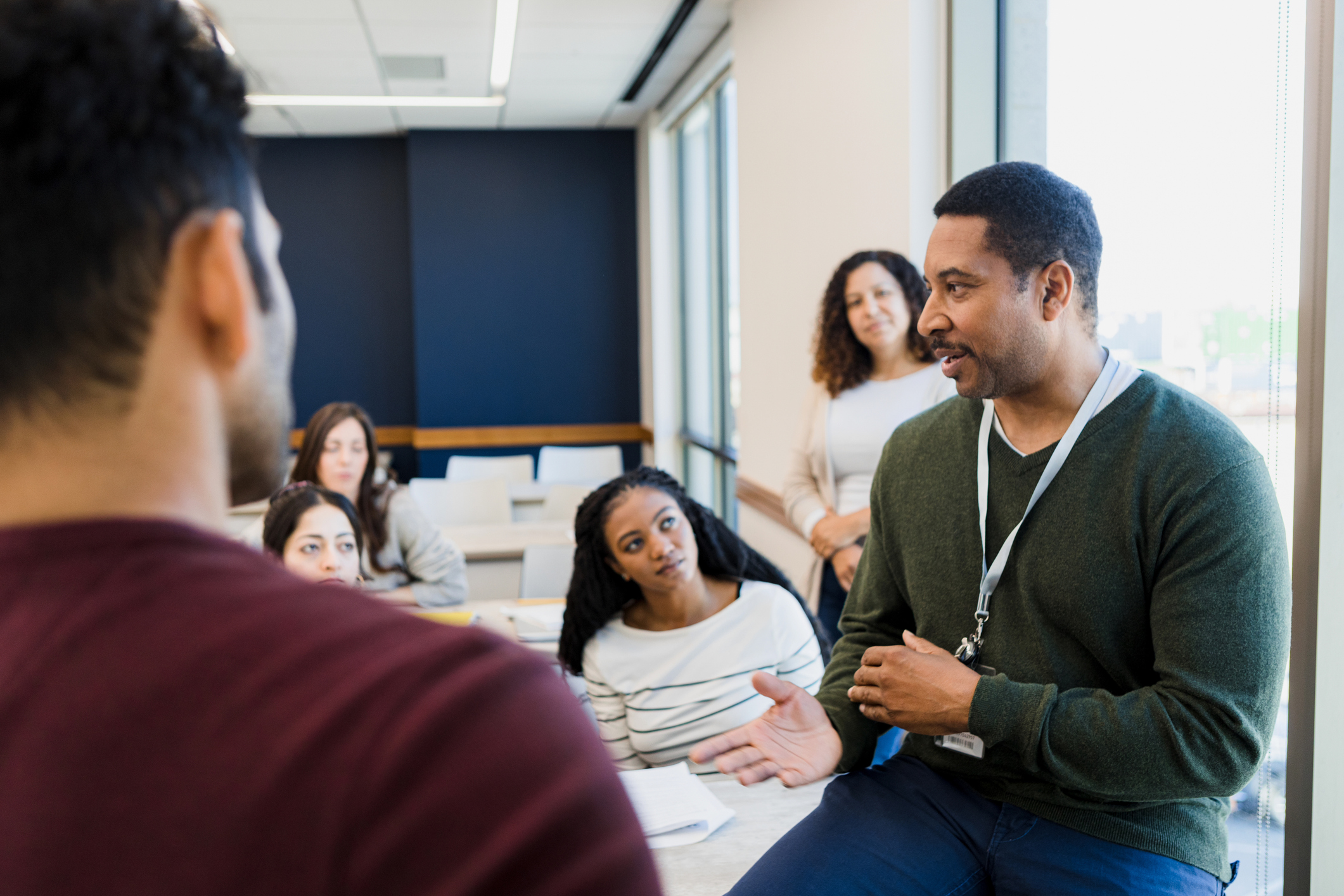 Tutor addresses the class