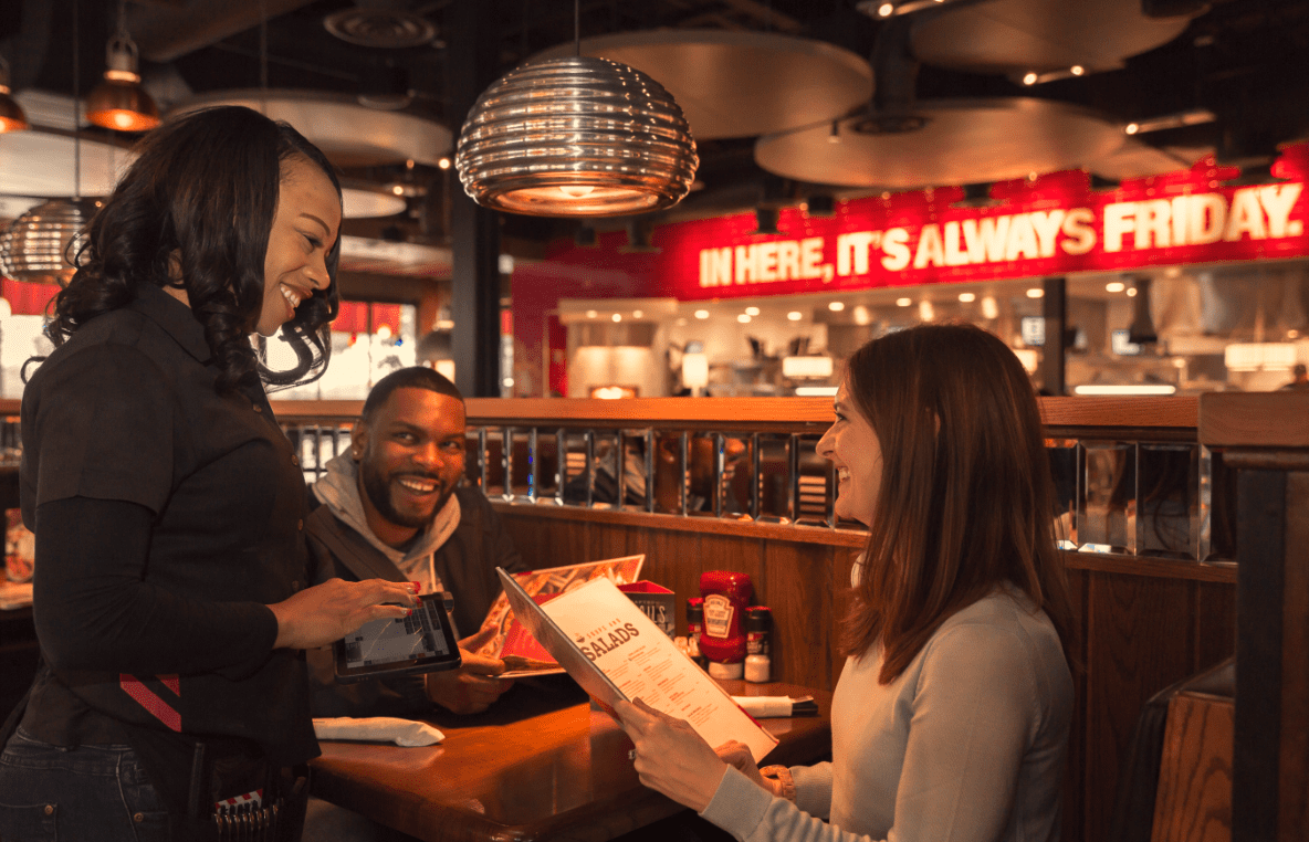 Customers ordering food at a restaurant
