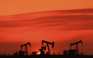 iStock_000004359216Medium.Three pumpjacks with setting sun_300