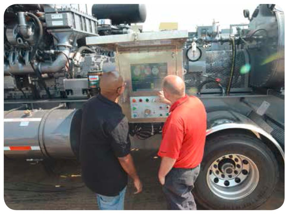 Two people interacting with a screen