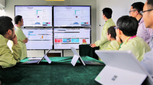 An image of doctors meeting and going over data.