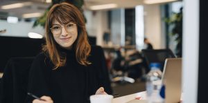 Woman sitting at desk in office