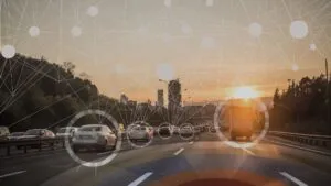 driving down a highway towards the sunset