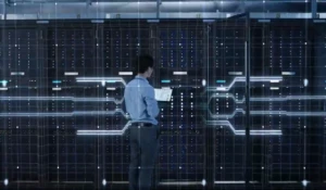 Man standing in front of servers