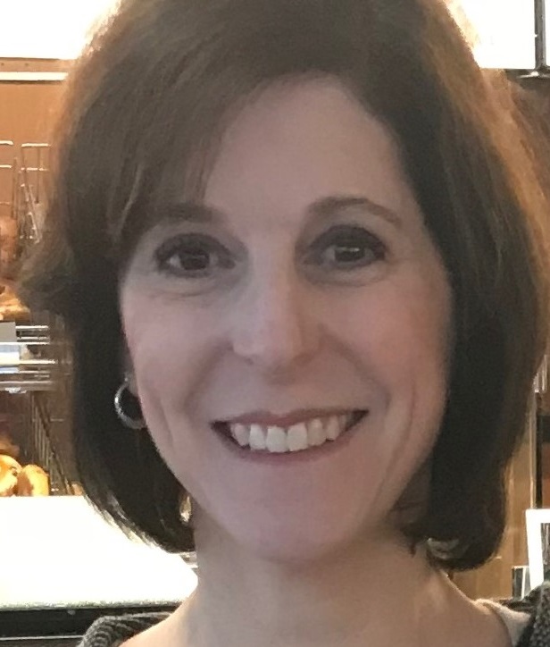 a woman smiling for the camera