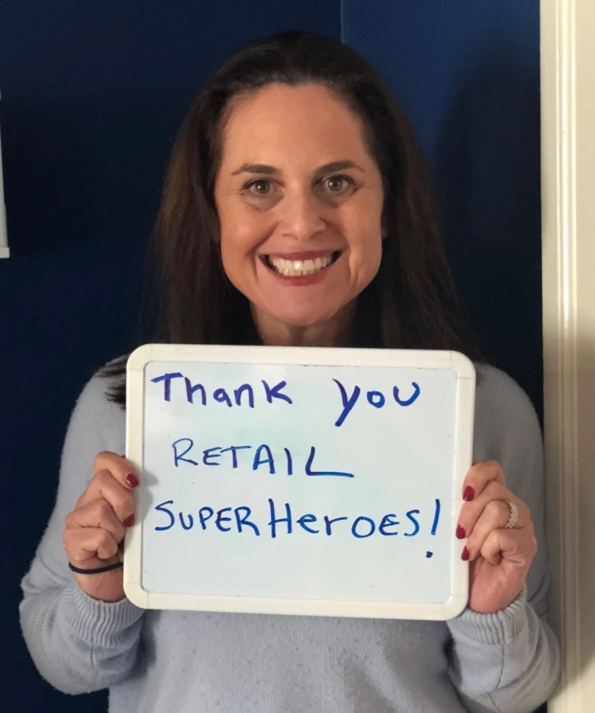 woman holding thank you sign