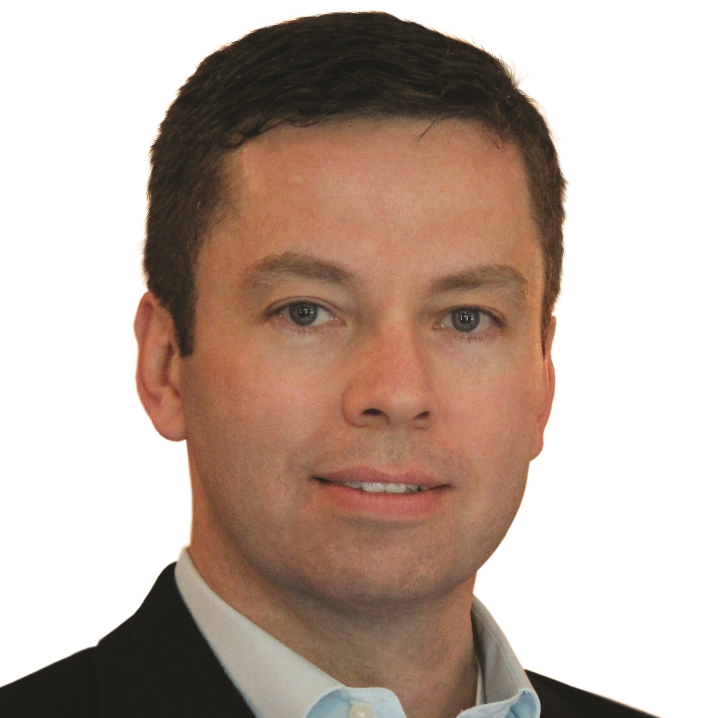 a man wearing a suit and tie smiling and looking at the camera