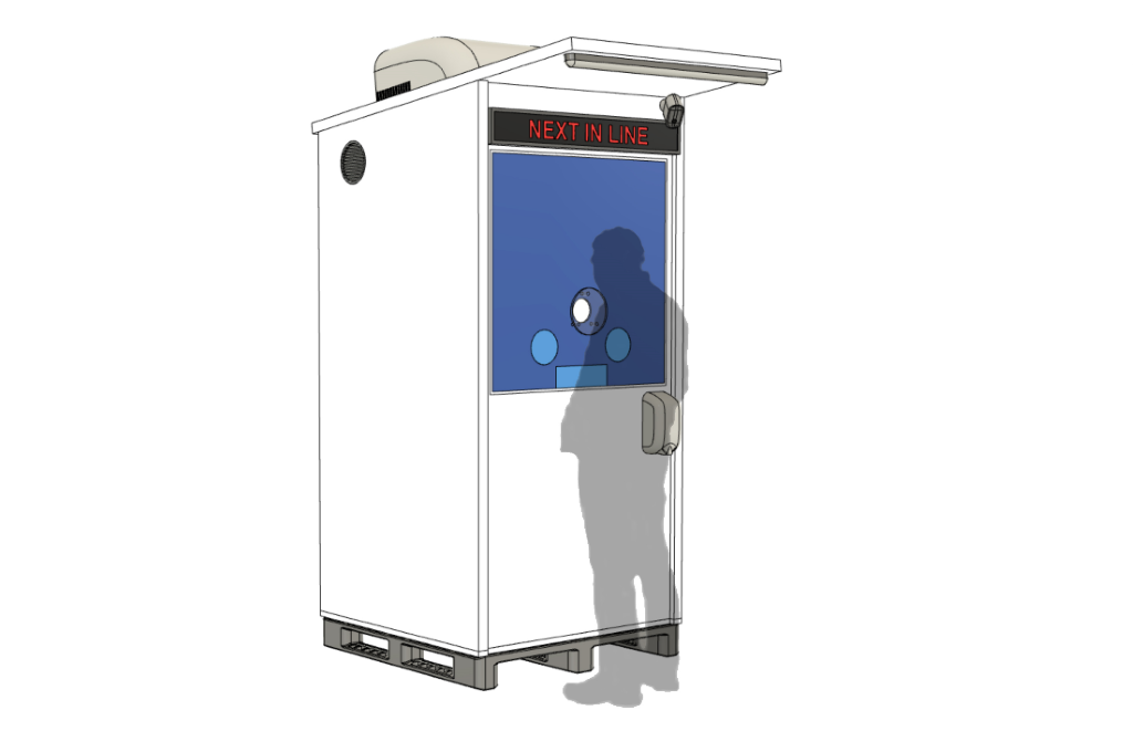 Man standing in front of a kiosk